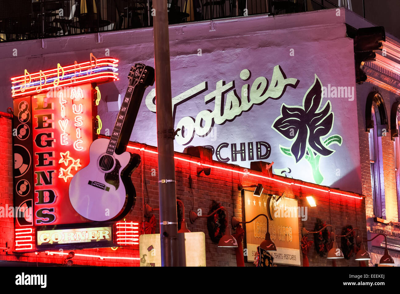 Signs for Tootsies, Legends and other honky-tonks on lower Broadway in Nashville, TN. Stock Photo