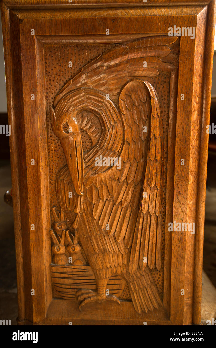 UK, England, Wiltshire, Bishop Cannings, St Mary the Virgin Church, pelican in her piety carved pew end Stock Photo