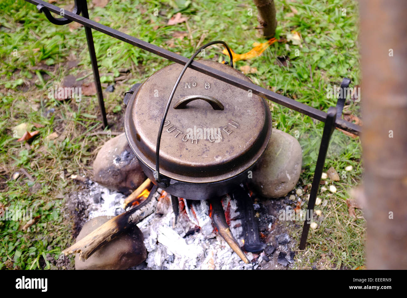 A Dutch oven cooking over an open fire at the Museum of Ontario Archaeology on Canada. Stock Photo