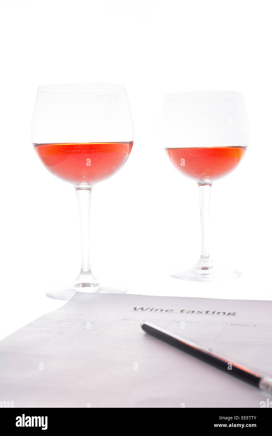 examination of the wine and notes the results Stock Photo