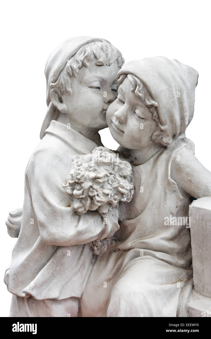 statue of boy hold flower and kiss the girl ( puppy love ) Stock Photo