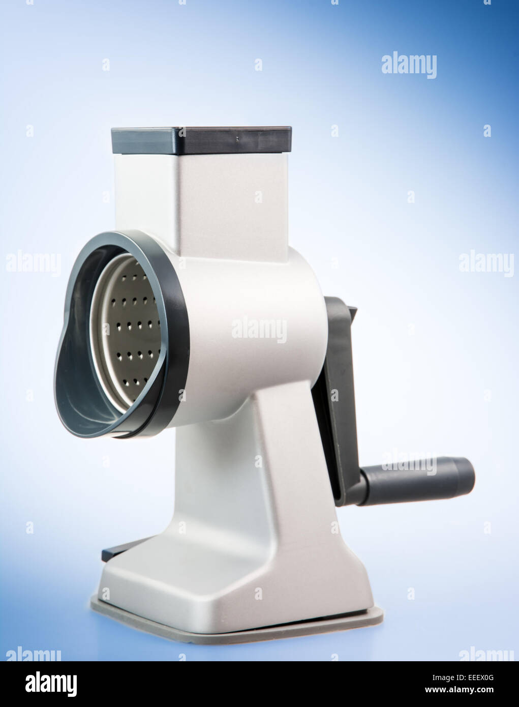 Cylindric drum grater (rotary cheese grater) with a crank handle Stock