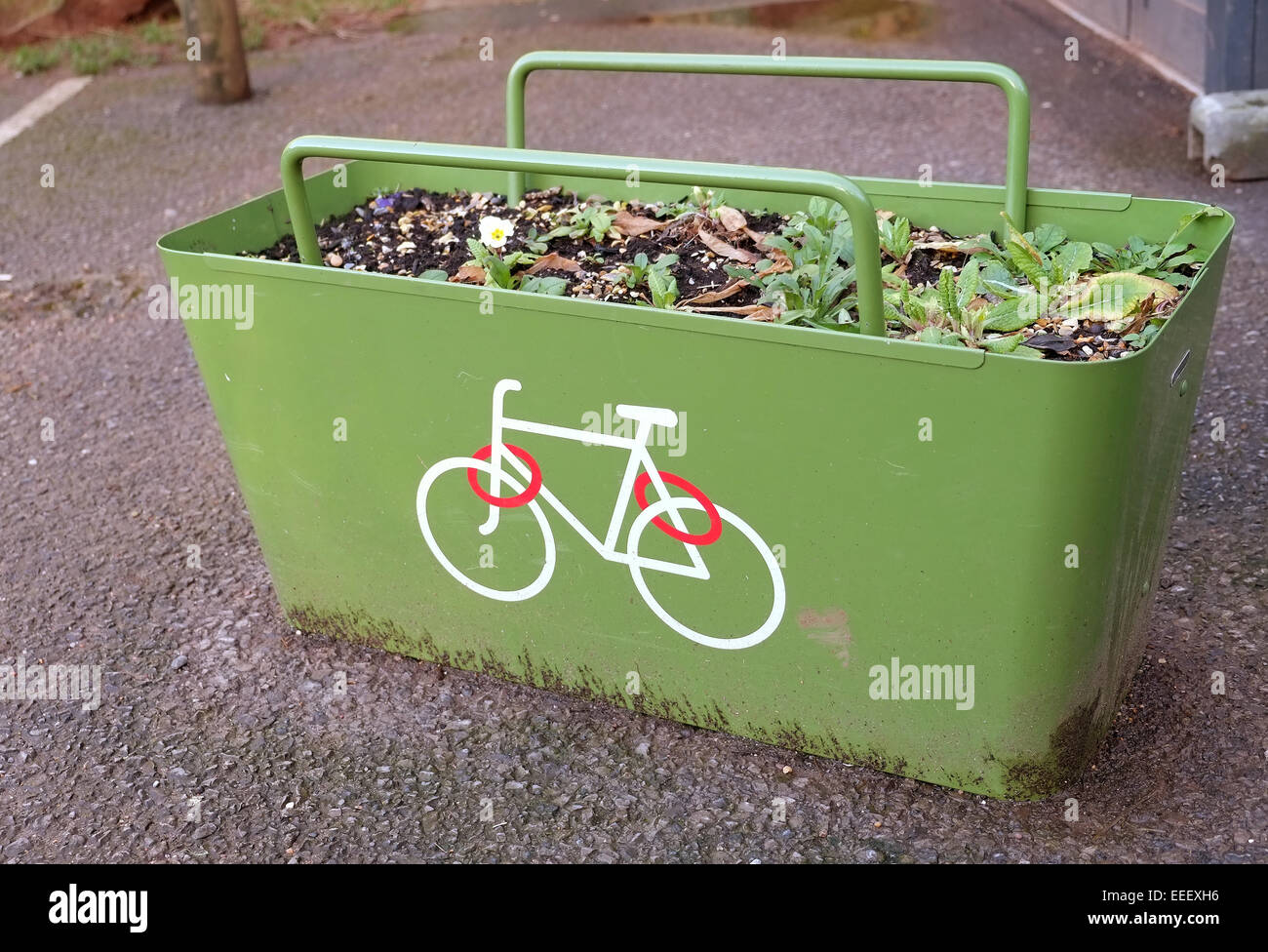 Flower pots and bike rack combined in Bristol at Snuff Mills, beside