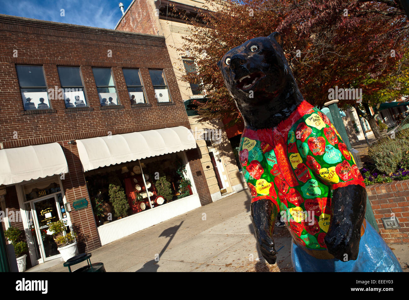 Decorated bear statue among the quaint boutiques and shops in historic