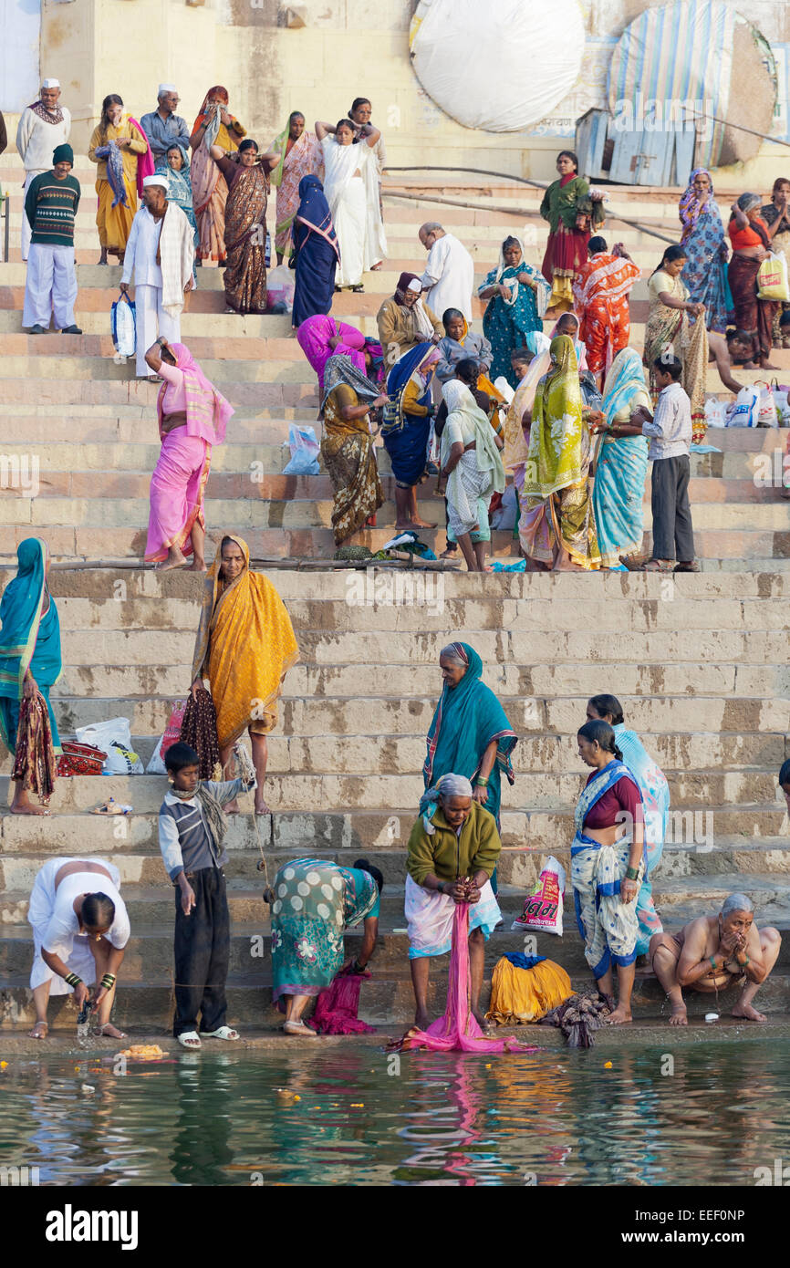 Varanasi, India. Hindus bathing, praying and washing clothes in the Ganges river Stock Photo