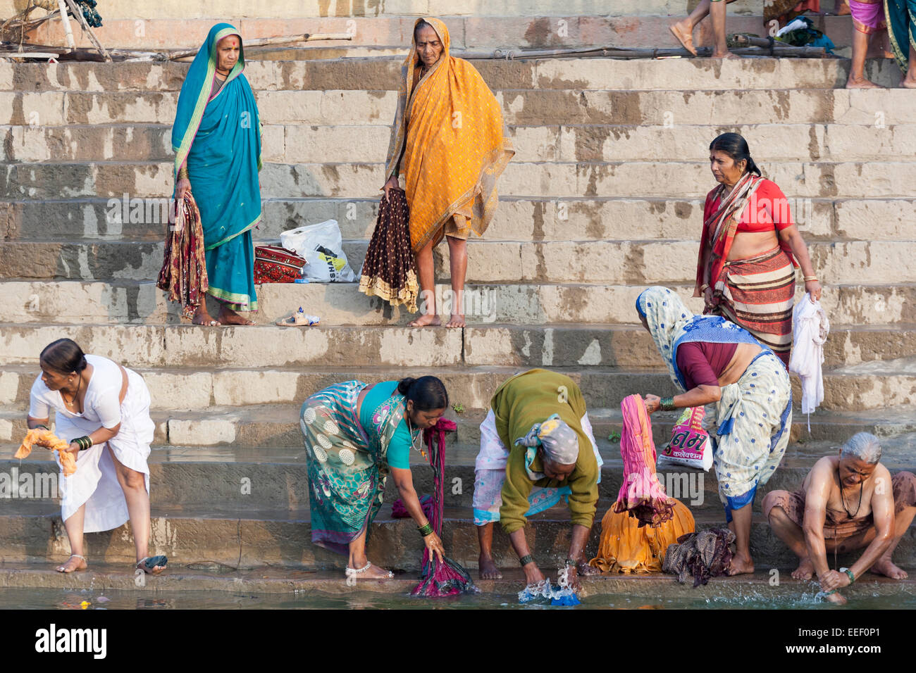 Varanasi, India. Hindus bathing, praying and washing clothes in the