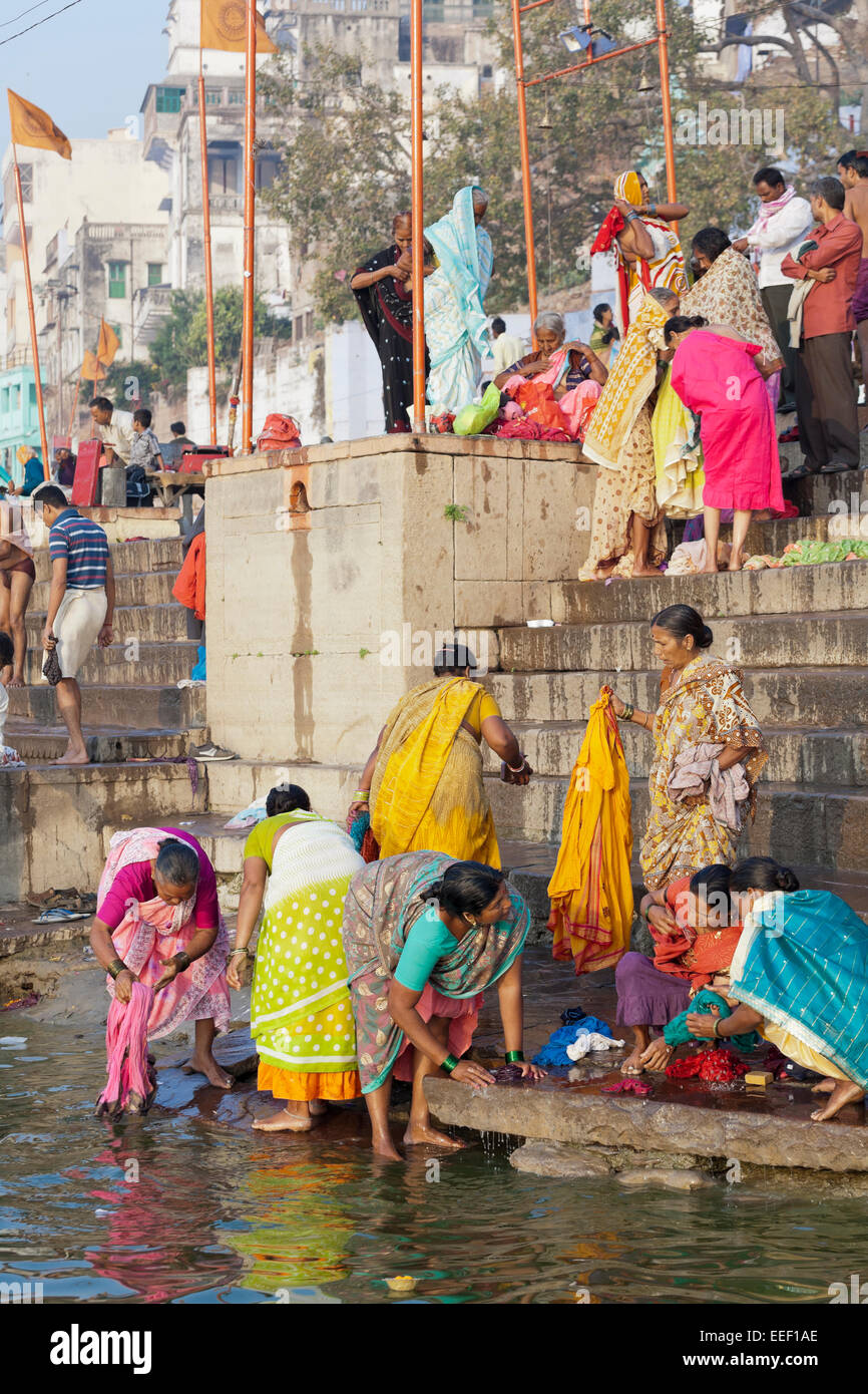 Varanasi, India. Hindus by the Ganges river, bathing, washing, praying Stock Photo