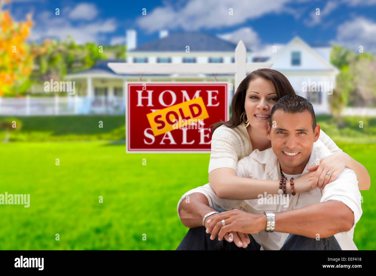 Young Happy Hispanic Young Couple in Front of Their New Home and Sold ...