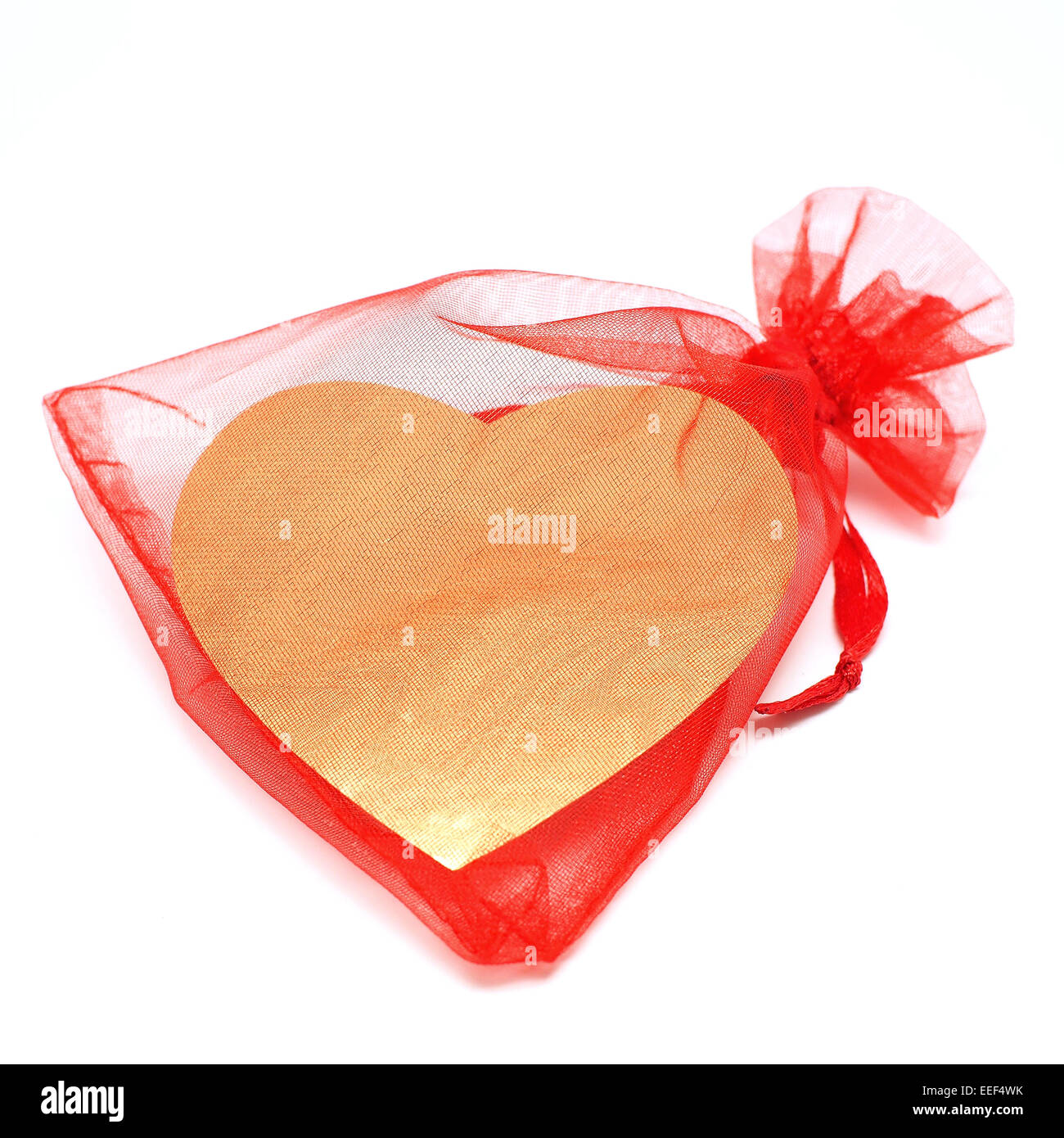 golden heart in red pouch for valentine gift Stock Photo