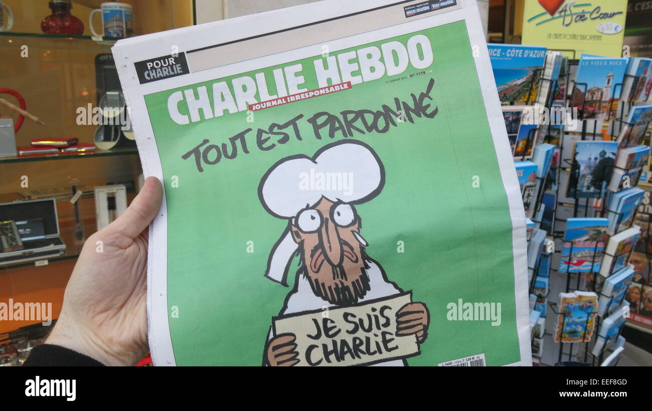 Image of the back cover of the Nice-Matin newspaper containing a replica of the Charlie Hebdo front cover. The Charile Hebdo new Stock Photo
