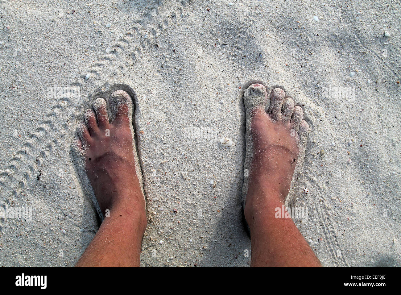 Bare feet and sand Stock Photo