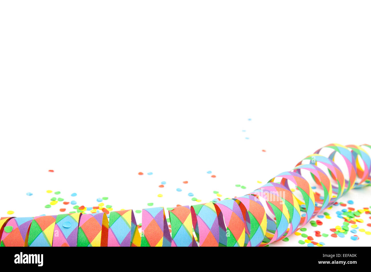 Party streamer and confetti on white background Stock Photo - Alamy