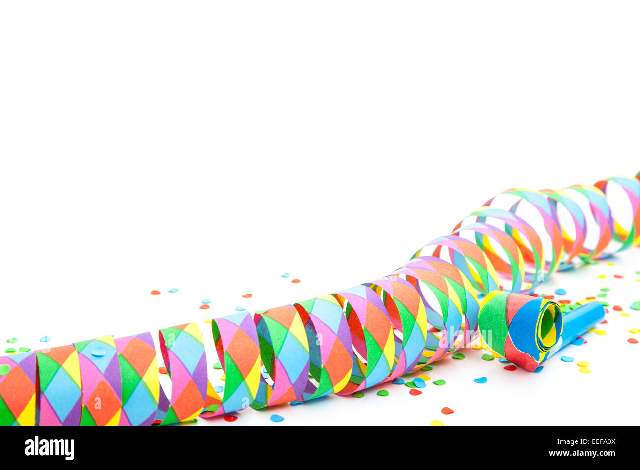 Party streamer and confetti on white background Stock Photo - Alamy