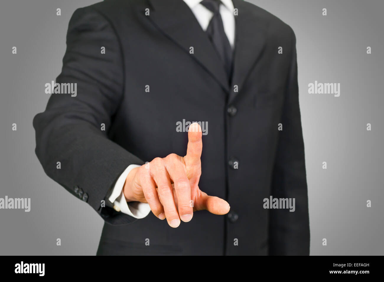 Businessman clicking on touch screen Stock Photo Alamy