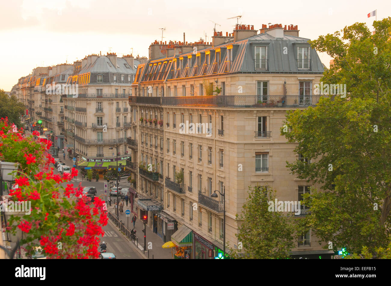 Typical Parisian buildings glow in sunset light Stock Photo