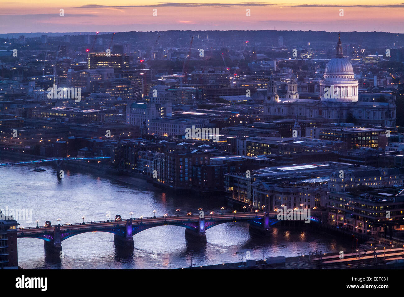 A night time, dusk view of St Paul's Cathedral and the City of London from the Shard in London Stock Photo
