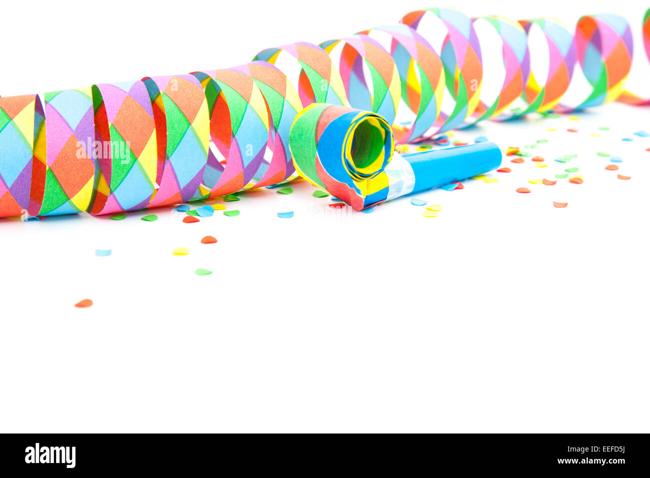 Party streamer and confetti on white background Stock Photo - Alamy