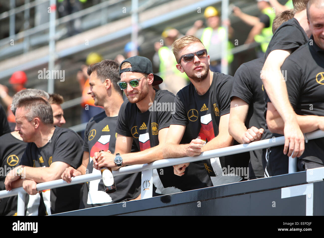 The Germany national football team arriving at Brandenburg Gate (Brandenburger Tor). 400,000 fans gathered at the so called Fanmeile to greet the winners of the 2014 World Cup.  Featuring: Atmosphere Where: Berlin, Germany When: 15 Jul 2014 Stock Photo