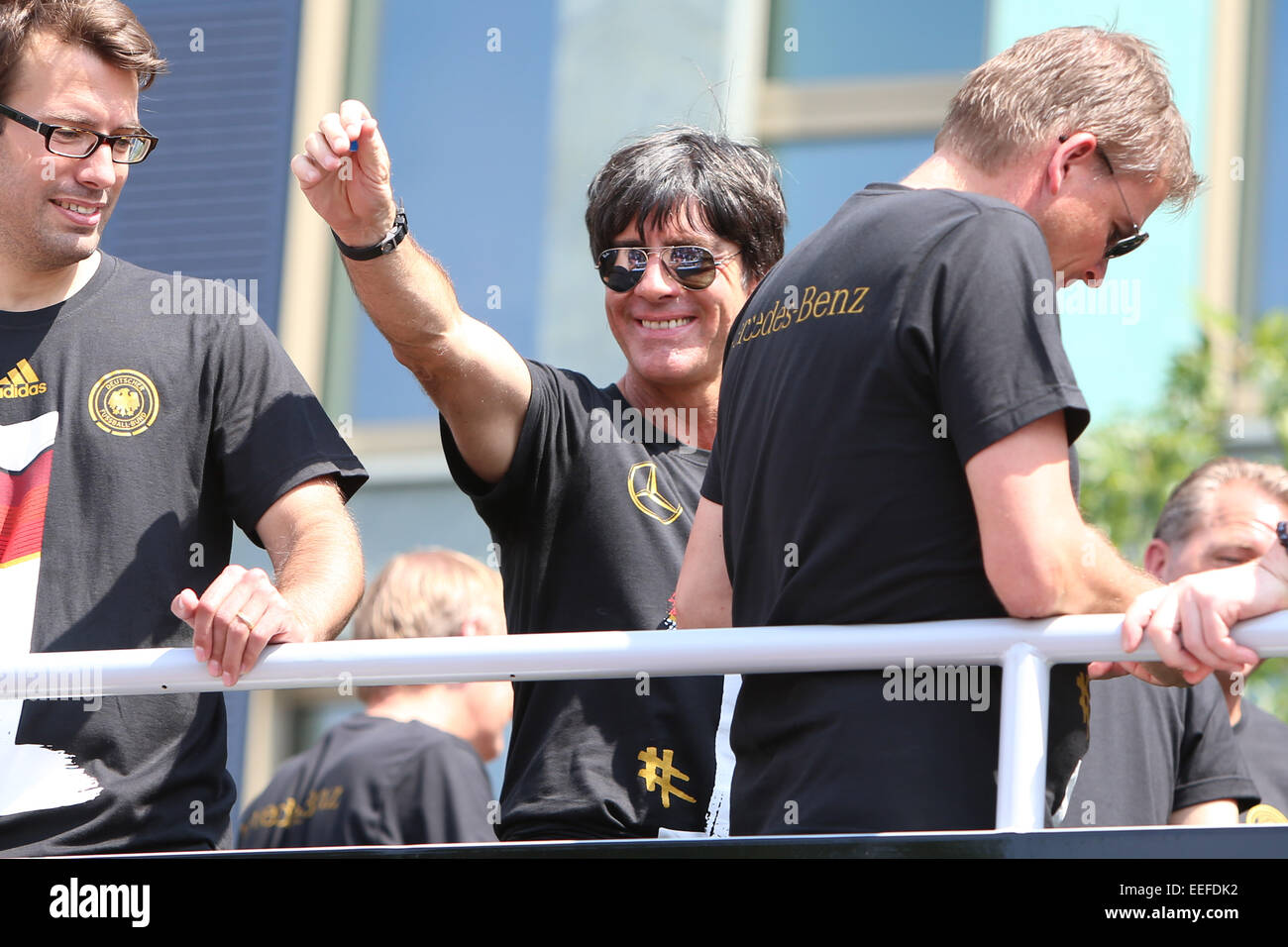 The Germany national football team arriving at Brandenburg Gate (Brandenburger Tor). 400,000 fans gathered at the so called Fanmeile to greet the winners of the 2014 World Cup.  Featuring: Jogi Loew Where: Berlin, Germany When: 15 Jul 2014 Stock Photo