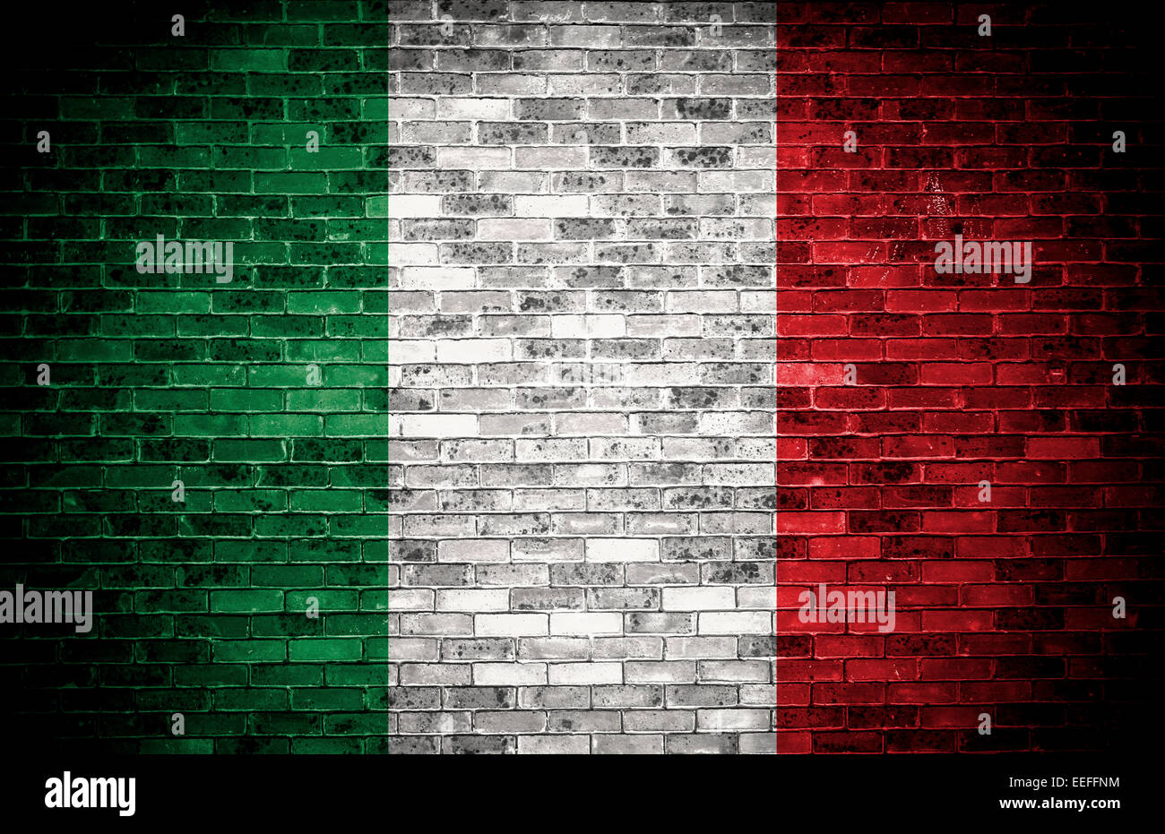 Italian flag on a grunge brick background. Stock Photo
