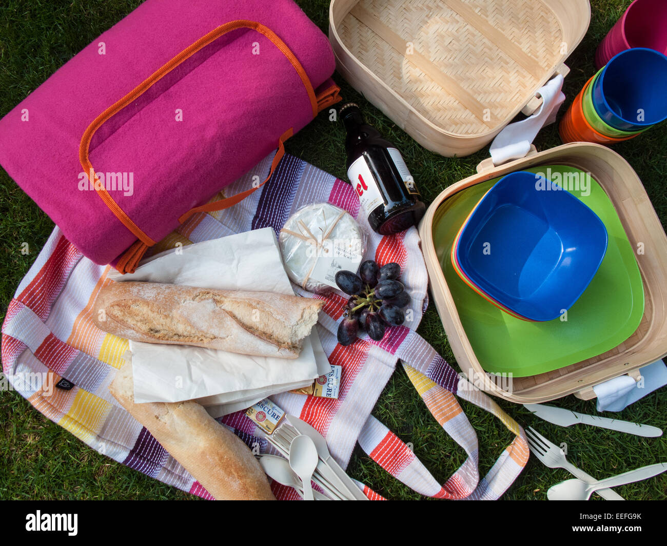 Outdoor picnic with bread cheese and fruit Stock Photo