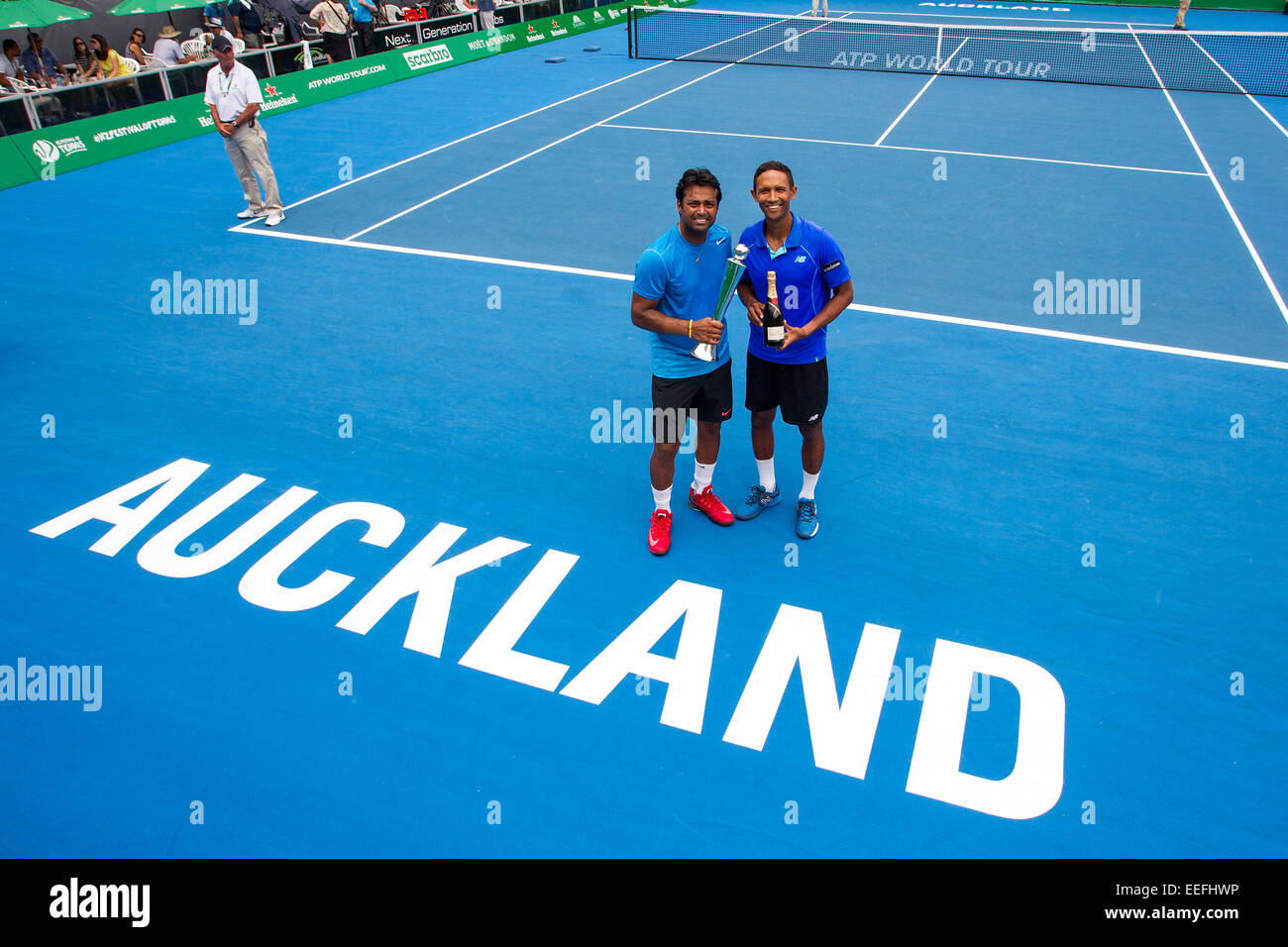 Auckland, New Zealand. 17th Jan, 2015. India`s Leander Paes left, and South  Africa`s Raven Klaasen with the trophy after defeating Great Britain`s  Dominic Inglot and Romania`s Florin Mergea in the doubles final