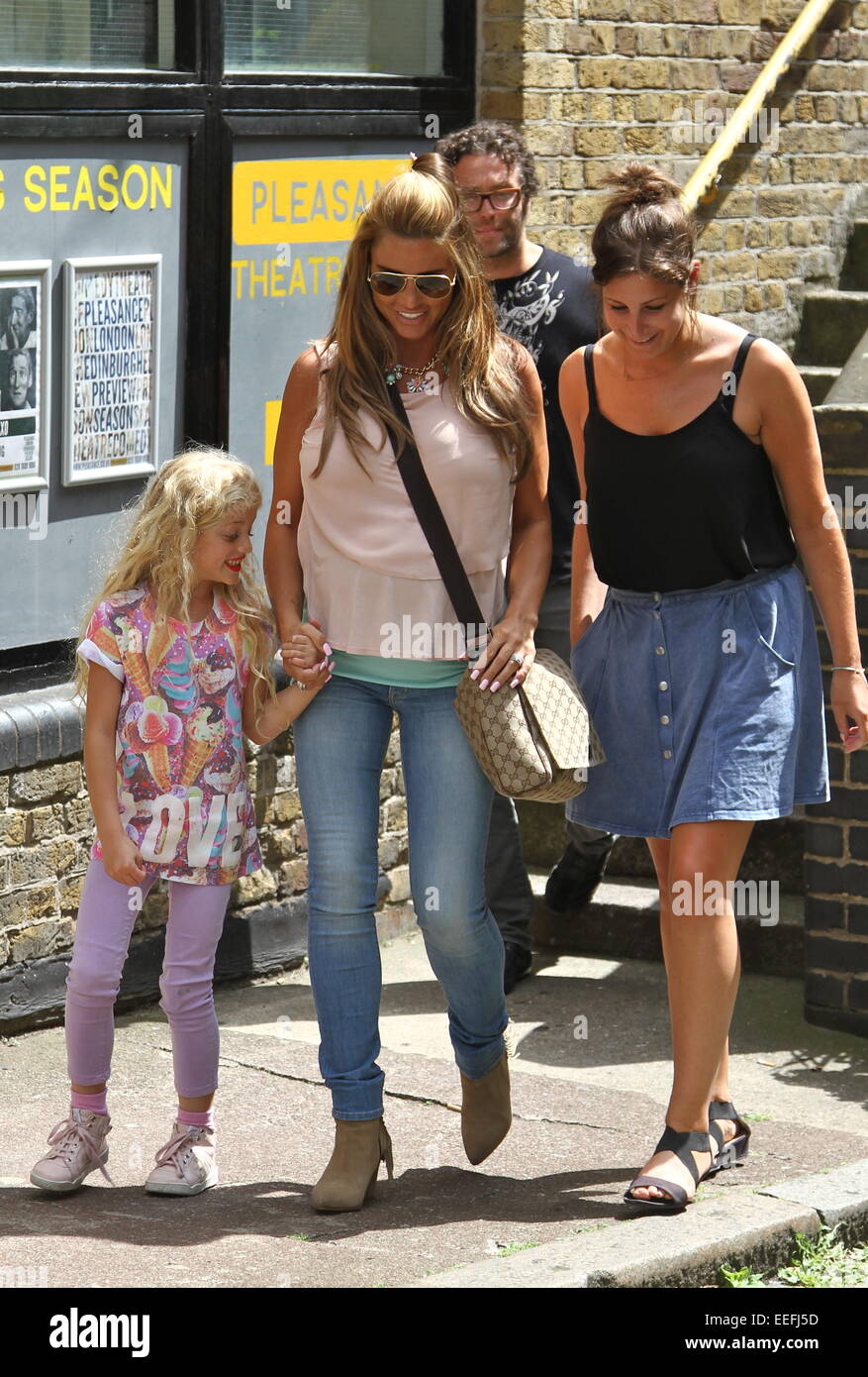 Katie Price and her daughter Princess Tiiaami seen leaving FUBAR Radio