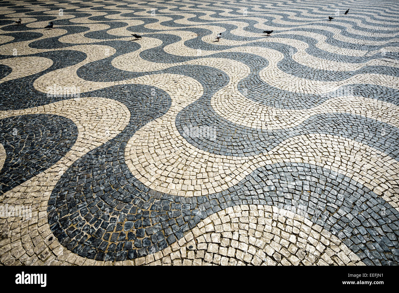 Portuguese Pavement at Rossio Square in Lisbon, Portugal. Stock Photo