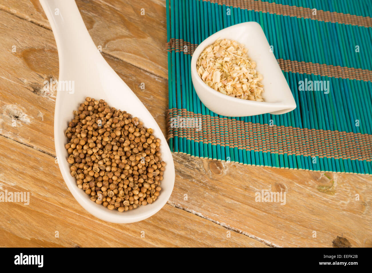 Dried coriander seeds and chopped lemon grass Stock Photo Alamy