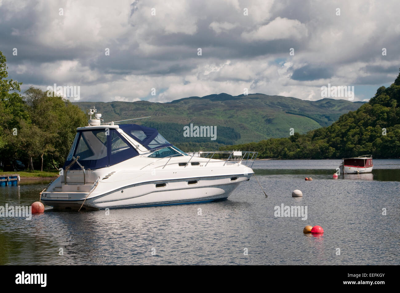 Motorboat moored in Luss Loch Lomond Scotland Stock Photo