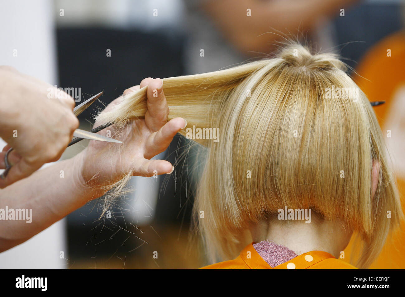 Stylist drying hair female hi-res stock photography and images - Alamy