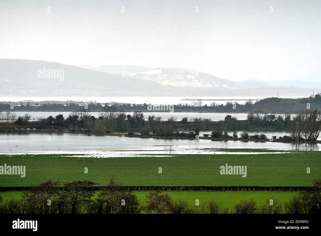 County Donegal, Ireland. 17th Jan, 2015. Ireland weather: Winter sunshine, County Donegal - 17 January 2015. Melting snow and rain floods farm land in Burnfoot, County Donegal.  Credit:  George Sweeney/Alamy Live News Stock Photo