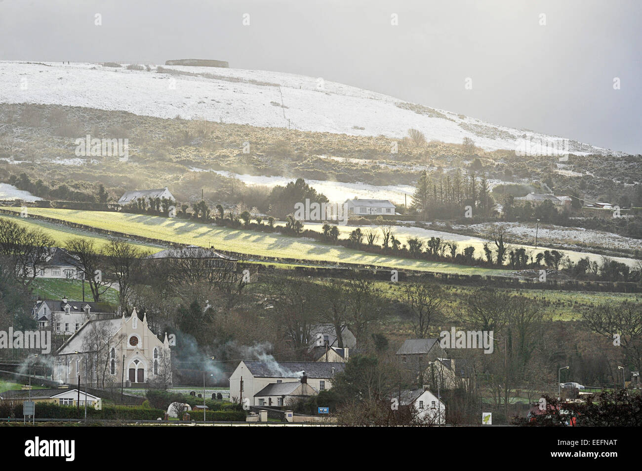 County Donegal, Ireland. 17th Jan, 2015. Ireland weather: Winter sunshine, County Donegal - 17 January 2015. Snow covered hills in winter sunshine, Burnfoot, County Donegal.  Credit:  George Sweeney/Alamy Live News Stock Photo