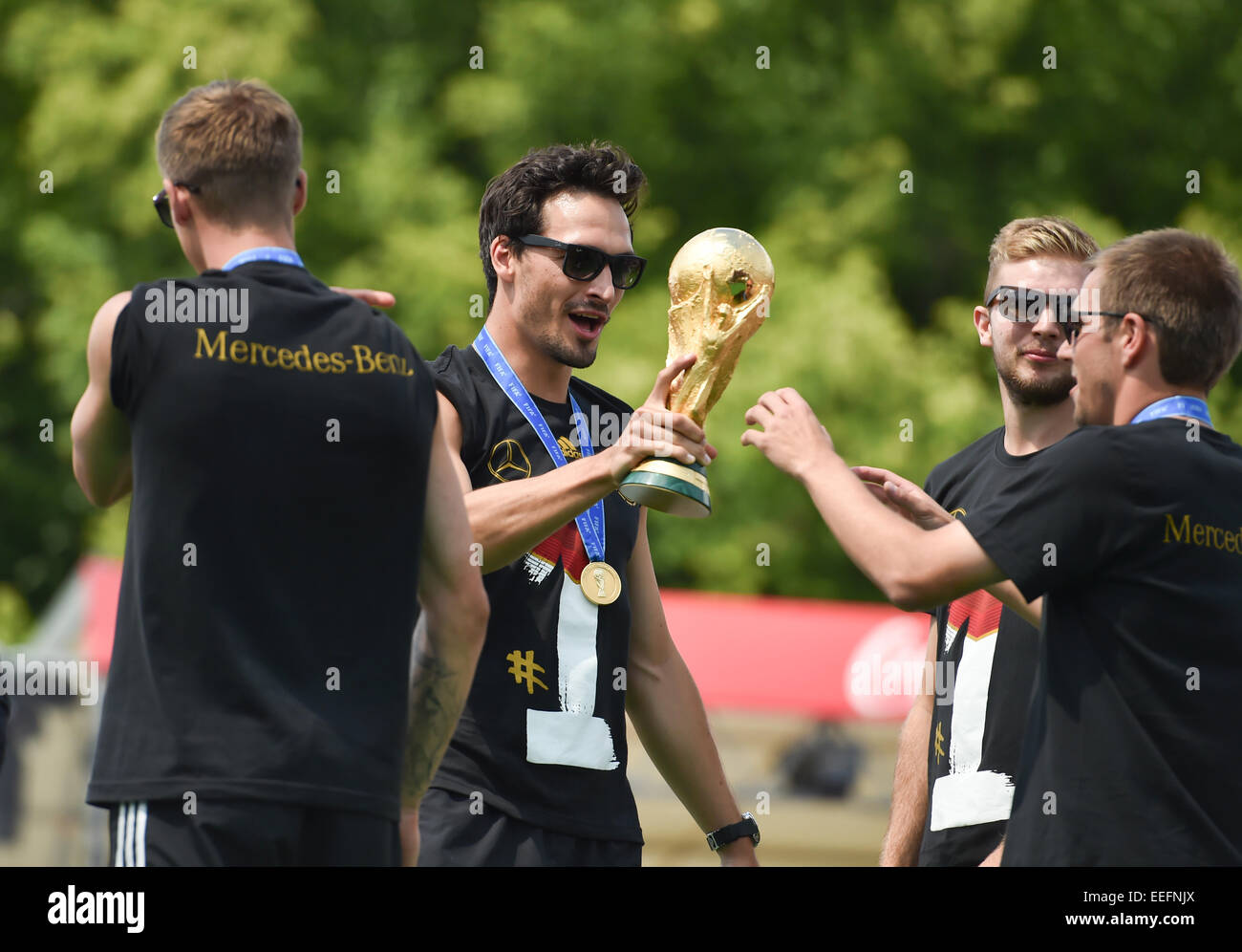 The Germany national football team celebrating their victory at Brandenburg Gate (Brandenburger Tor). 400,000 fans gathered at the so called Fanmeile to greet the winners of the 2014 World Cup.  Featuring: Mats Hummels,Philipp Lahm,Christoph Kramer,Guest Stock Photo