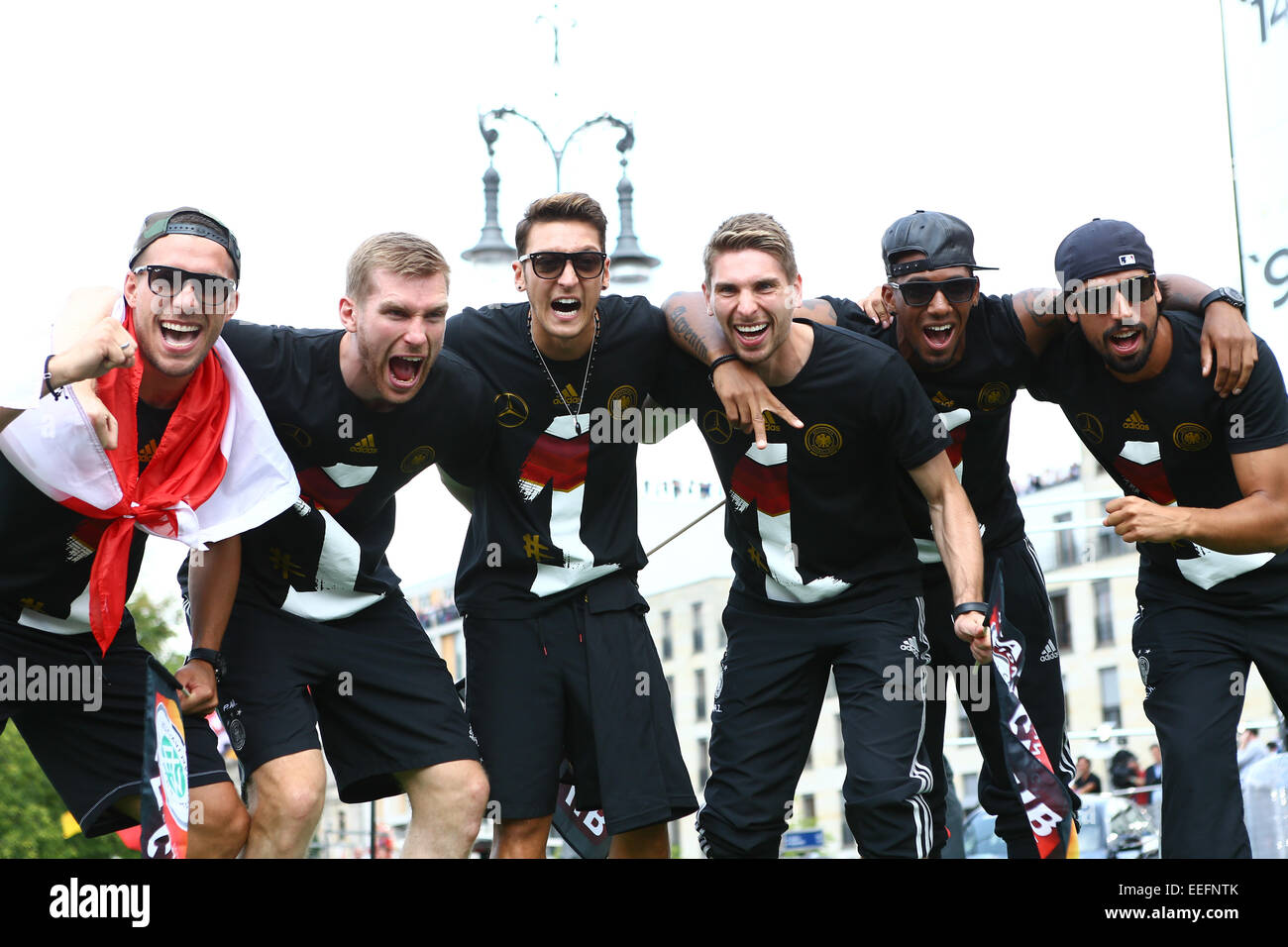 The Germany national football team celebrating their victory at Brandenburg Gate (Brandenburger Tor). 400,000 fans gathered at the so called Fanmeile to greet the winners of the 2014 World Cup.  Featuring: Lukas Podolski,Per Mertesacker,Ron-Robert Zieler, Stock Photo