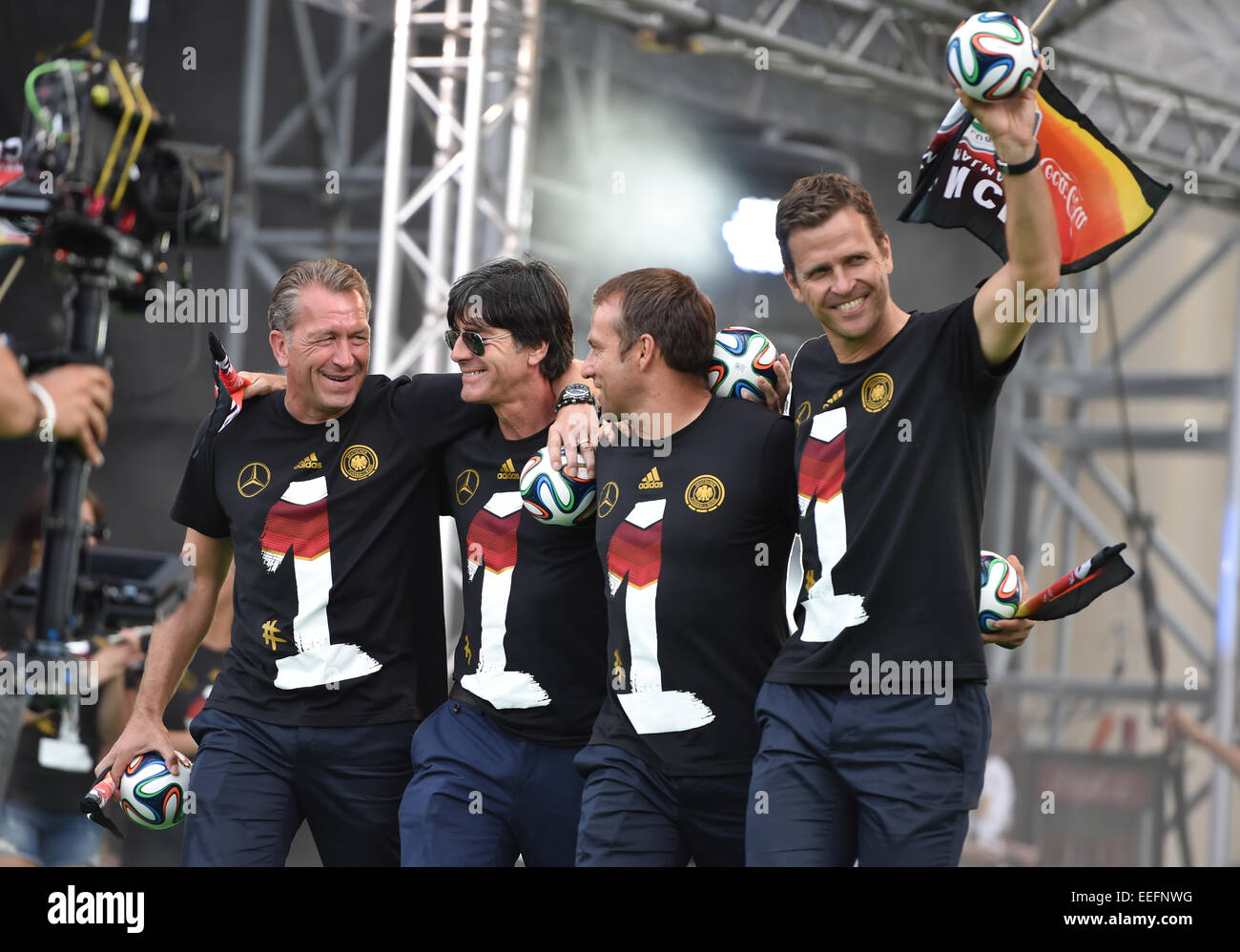 The Germany national football team celebrating their victory at Brandenburg Gate (Brandenburger Tor). 400,000 fans gathered at the so called Fanmeile to greet the winners of the 2014 World Cup.  Featuring: Andreas Köpke,Joachim Löw,Hansi Flick,Oliver Bier Stock Photo