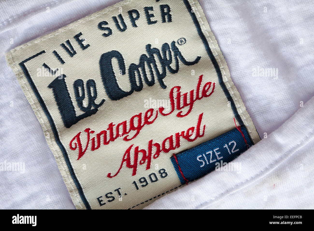 Live Super Lee Cooper Vintage Style Apparel Est 1908 label in Size 12  woman's white jeans Stock Photo - Alamy