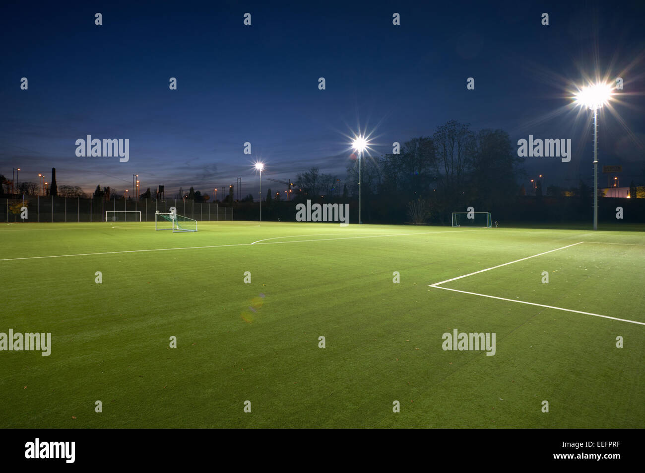 Berlin, Germany, football pitch with floodlights at night Stock Photo