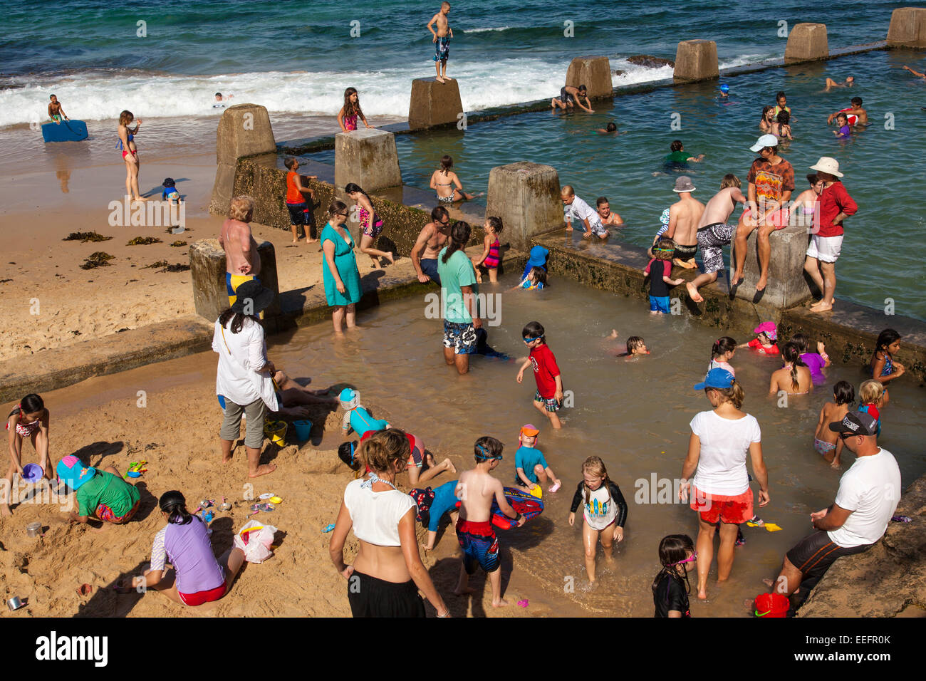 Children swimming in the Coogee Rockpool, Sydney, New South Wales, Australia Stock Photo