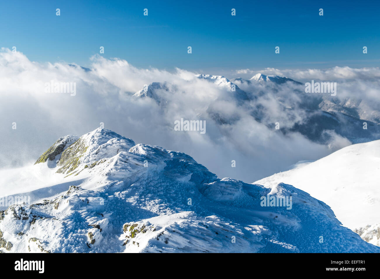 Tatra mountains - winter view above clouds Stock Photo - Alamy