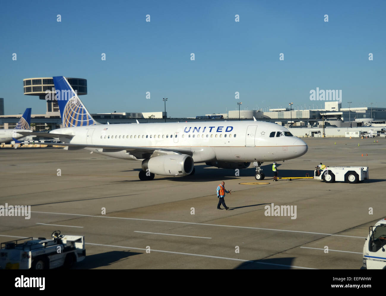 CHICAGO - SEPTEMBER 22: United Airlines passenger jet arrives in its home base of Chicago on September 22, 2013. Stock Photo