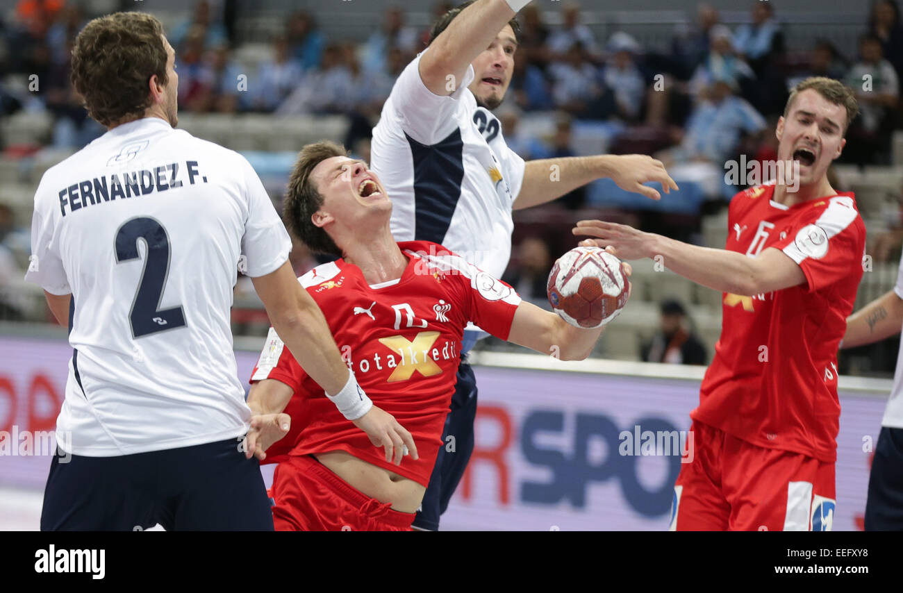 Argentina's Federico Fernandez (l-r), Denmarks's Hans Lindberg, Argentina's Sergio Crevatin and Denmarks's Casper Mortensen challenge for the ball during the men's Handball World Championship 2015 Group D match between Denmark and Argentina at the Lusail Multipurpose Hall in Lusail outside Doha, Qatar, 16 January 2015.  Stock Photo