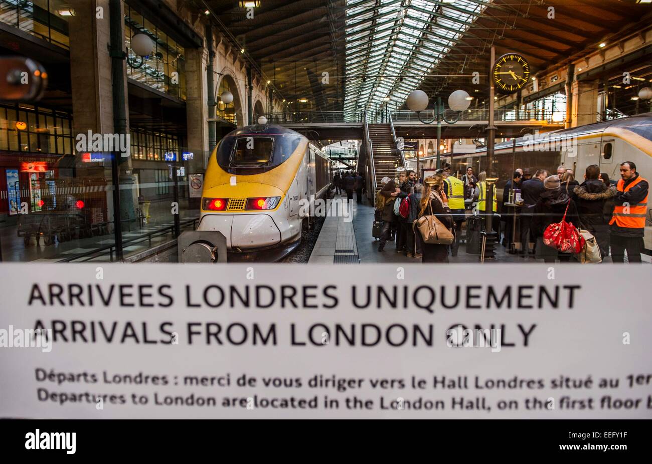 Paris, France. 17th Jan, 2015. Passengers get off a Eurostar train that reversed from the Channel Tunnel due to a fire alarm at the Gare du Nord train station in Paris, France, Jan. 17, 2015. All services of Eurostar were suspended Saturday due to smoke detection in the Channel Tunnel, Eurostar announced Saturday. All trains were returning to original stations as the Channel Tunnel linking Britain and France was closed until further notice, Eurostar's customer care team said on its Twitter account. Credit:  Chen Xiaowei/Xinhua/Alamy Live News Stock Photo