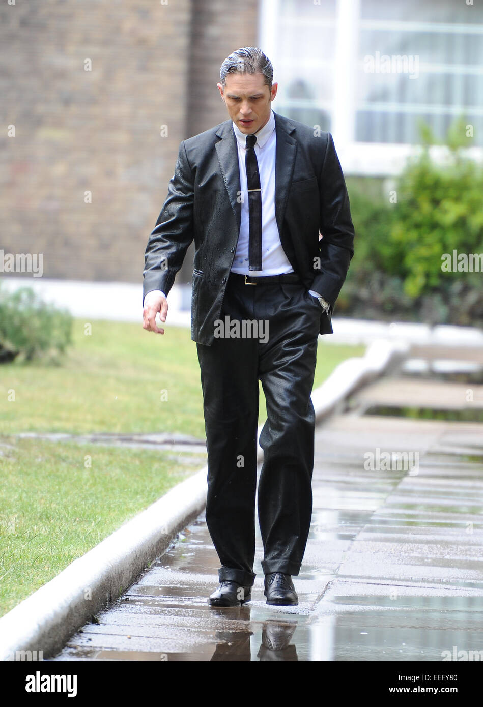 Tom Hardy and Emily Browning on the set of the film 'Legend' in East Stock  Photo - Alamy