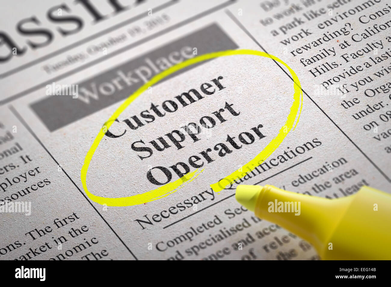 Customer Support Operator Vacancy in Newspaper. Stock Photo