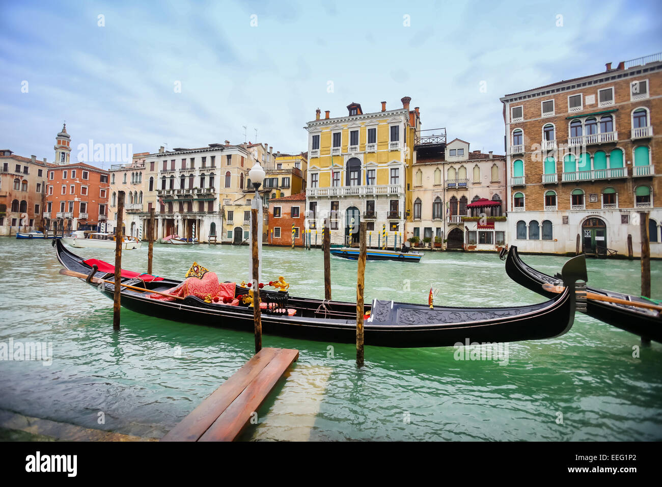 A view of an empty gondola parked in a Campo Erberia square on grand canal in Venice, Italy. Stock Photo