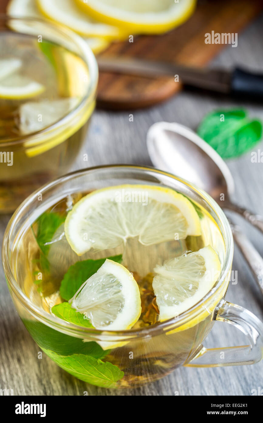 Cup with mint and lemon tea Stock Photo Alamy