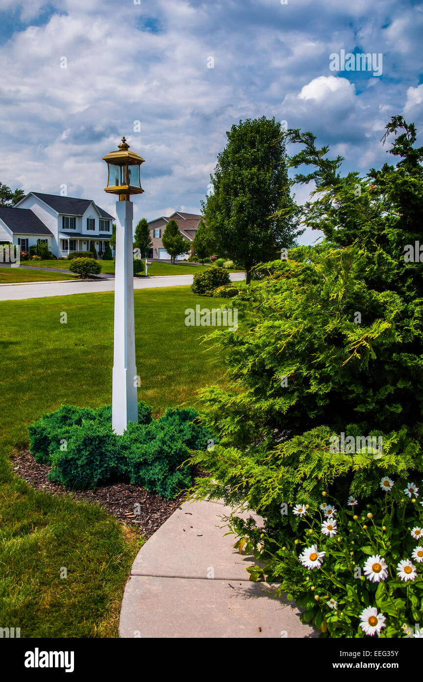 Path and lightpost in garden Stock Photo