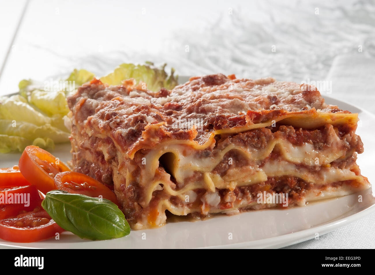 lasagna is a typical Italian meal, made with fresh pasta baked with meat sauce and bechamel sauce Stock Photo