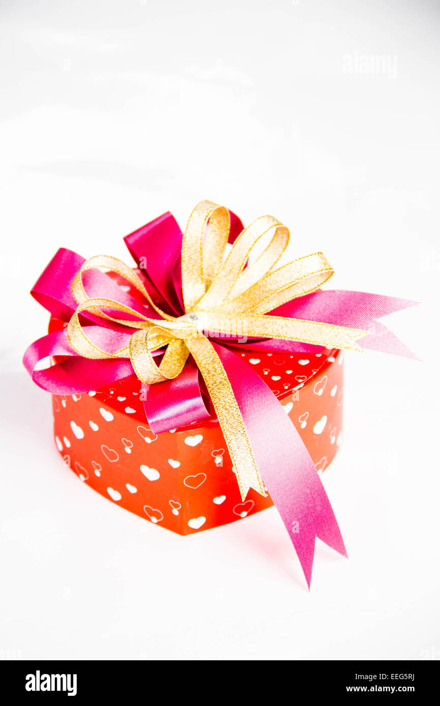 Gold gift box with ribbon and bow isolated on white background Stock ...